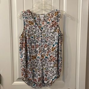 Sleeveless flower print shirt